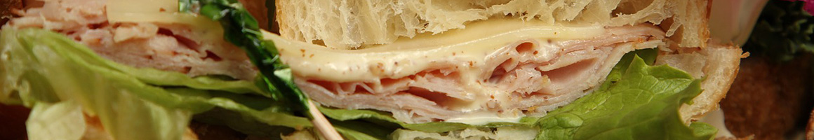 Eating Deli Sandwich at Big A Sub Shop restaurant in Malden, MA.